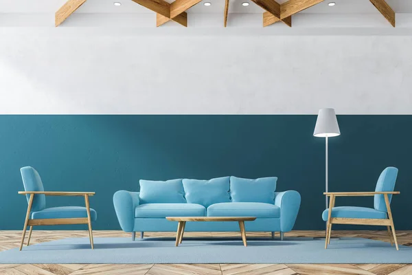 Interior of modern living room with white and blue walls, wooden floor and blue sofa with armchairs standing near wooden coffee table. 3d rendering
