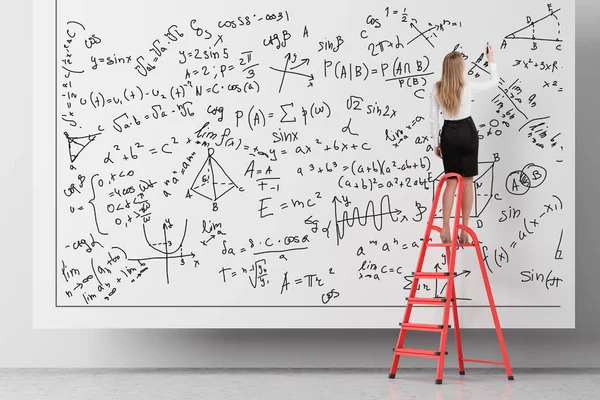 Rear View Blonde Woman Standing Ladder Writing Formulas White Wall — Stock Photo, Image