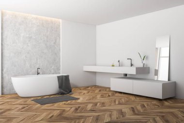 Modern banyo beyaz ve beton duvarlar, ahşap zemin, havlu ile beyaz küvet ile bir köşesinde ve uzun beyaz lavabo ayna ile. 3D render