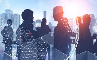Siluetleri iş adamları iş gezegen hologram çift pozlama ile cityscape arka plan üzerinde tartışıyor. Uluslararası şirket kavramı. Tonlu görüntü