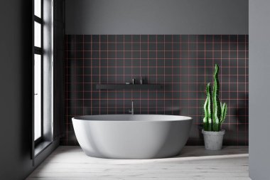 Gri ve siyah taş duvarlar, beton zemin, pencere ve kremler ile siyah raf yakın duran gri küvet ile minimalist banyo iç. 3D render