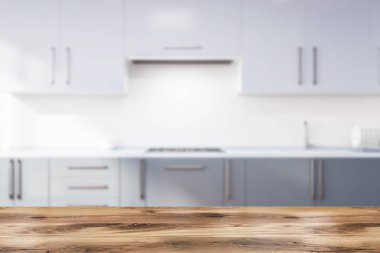 Minimalist mutfak iç beyaz duvarlar, ahşap zemin ile koyu gri mutfak tezgahı ile Ocak ve lavabo ve ışık gri dolabı inşa. 3d render bulanık