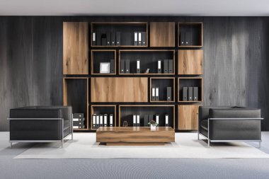 İç office lounge gri ahşap duvarlar, halı kaplı zemin, iki büyük koltuk kare sehpa yakınındaki ve klasörlerle ahşap kitaplık. 3D render