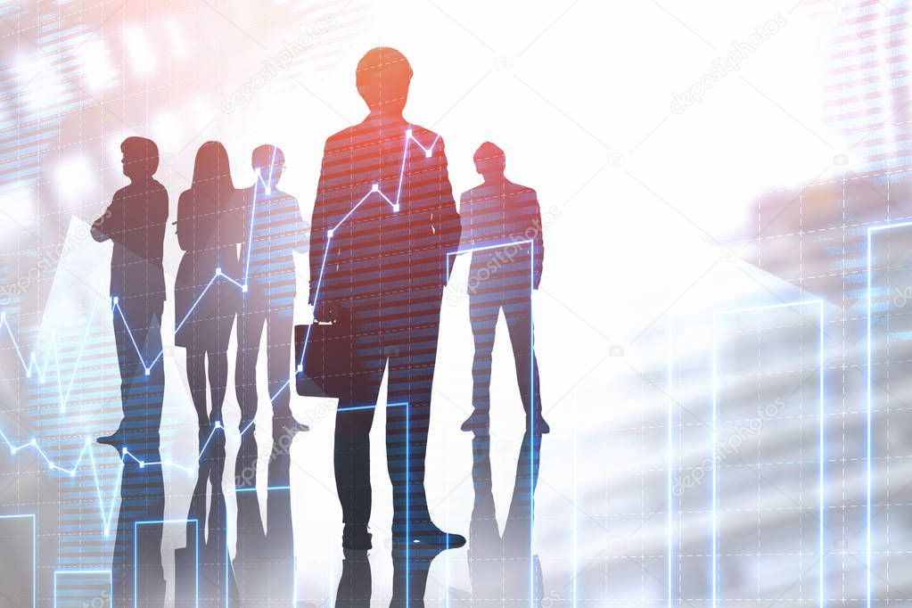 Silhouettes of diverse business team members over blurred cityscape background with double exposure of graphs. Toned image mock up