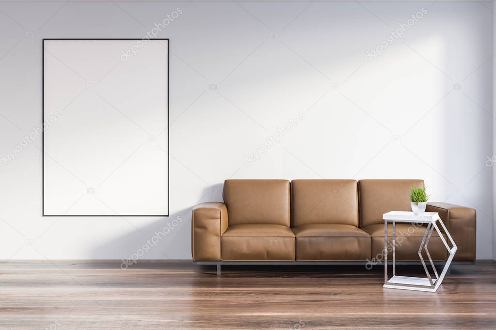 Minimalistic living room interior with white walls, wooden floor, leather sofa standing near coffee table with flower pot and vertical poster. 3d rendering mock up