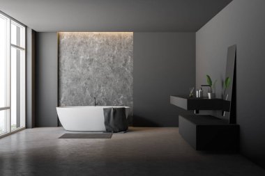 Gri ve beton duvarlar, beton zemin, havlu ve uzun gri lavabo ile beyaz küvet banyo iç. 3D render
