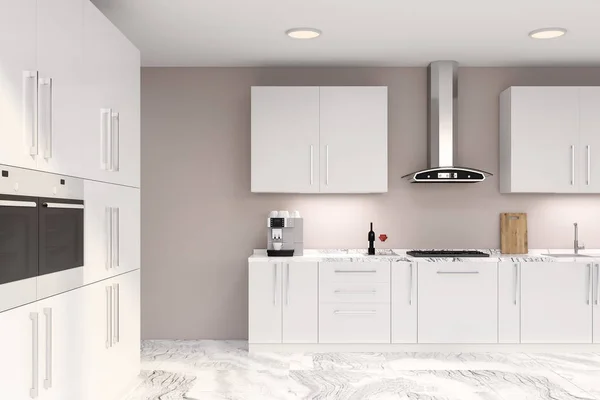 时尚厨房的内部与米色的墙壁 白色大理石地板 白色台面内置水槽和炊具和白色柜子与两个内置烤箱 — 图库照片