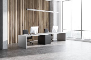 Beton ve ahşap duvarlar, beton zemin, panoramik pencere ve iki siyah ve beyaz bilgisayar masaları ile modern ofis iç. 3D render