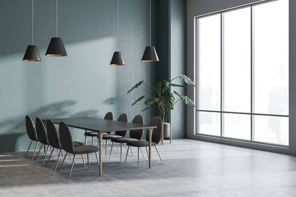 Уголок стильной столовой с зелеными и белыми стенами, бетонный пол, длинный серый стол с мягкими серыми стульями и большим окном. 3d-рендеринг

