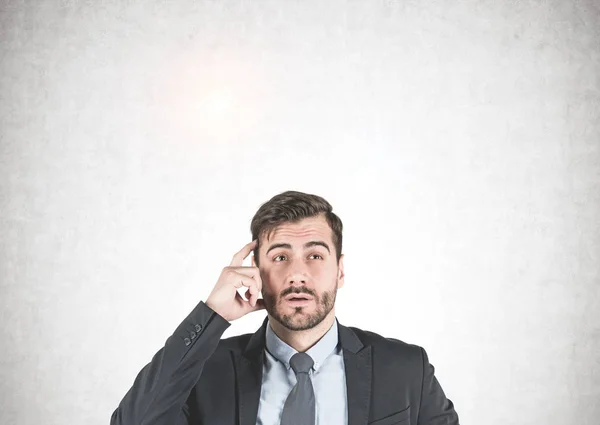 Portrait Young Businessman Beard Wearing Dark Suit Thinking His Finger — Stock Photo, Image