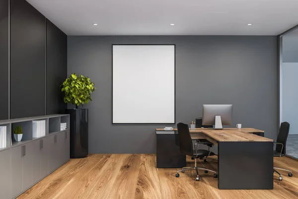 Interior of manager office with gray and black walls, wooden floor, black and wooden computer table with black chairs and vertical poster. 3d rendering mock up