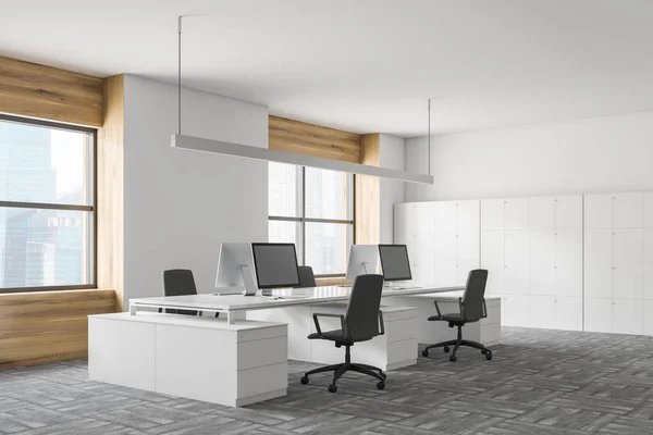 Corner of stylish office with white and wooden walls, gray carpet and two massive computer tables with gray chairs. 3d rendering
