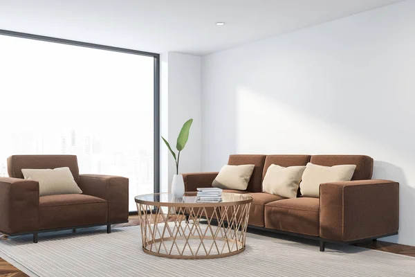 Corner of loft living room with white walls, wooden floor, brown sofa and armchair standing near round coffee table on white carpet. 3d rendering