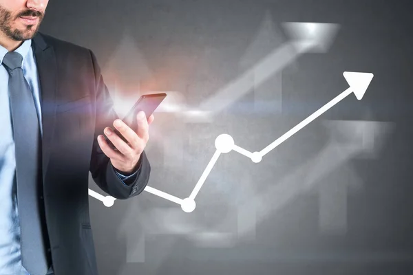 Man with smartphone and growing graph — Stock Photo, Image