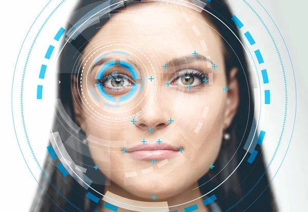 Beautiful woman with face recognition interface