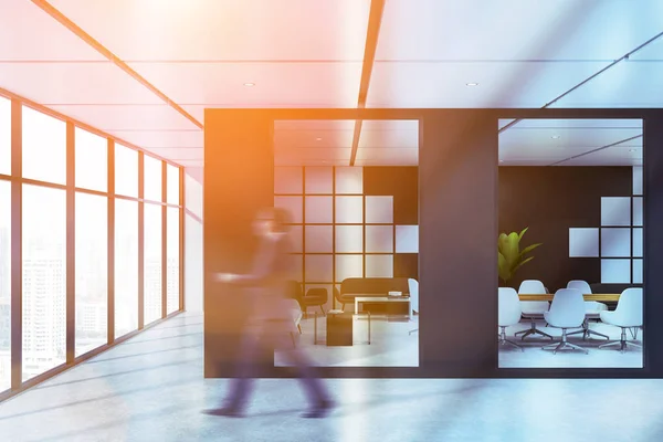 Man near black and white conference room — Stock Photo, Image