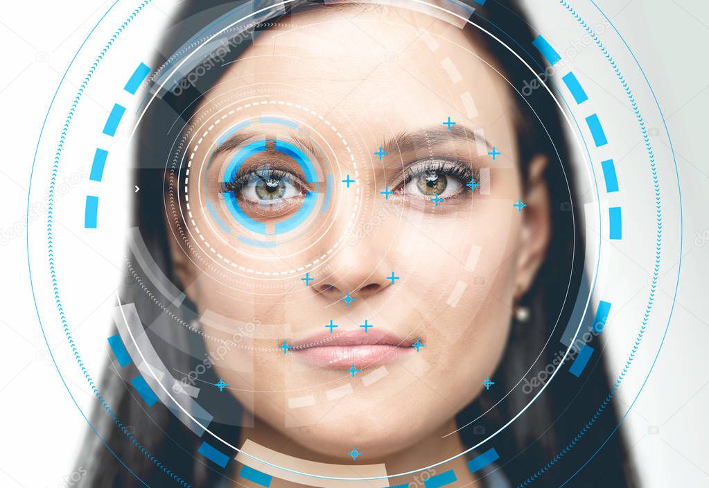 Beautiful woman with face recognition interface