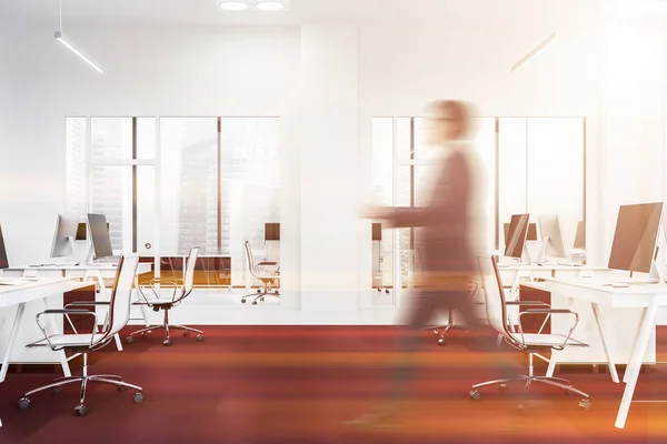 Side view of white office with red carpet, man — Stock Photo, Image