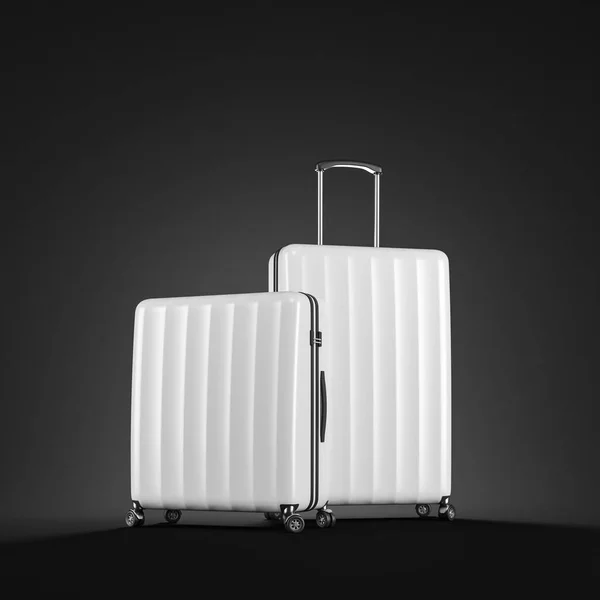 黒の上の 2 つの白いスーツケース — ストック写真