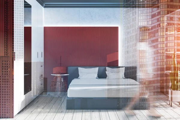 Женщина в интерьере бетона и красной спальни — стоковое фото