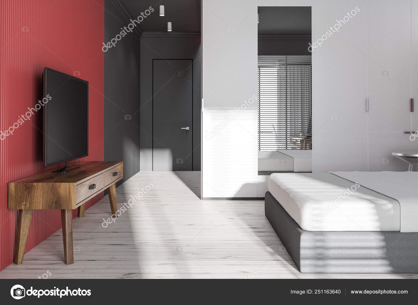Side View Of Gray And Red Bedroom With Tv Set Stock Photo