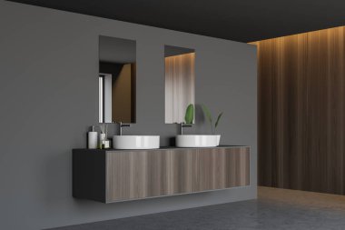 Gri ve ahşap banyo köşesi, çift lavabo
