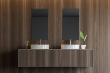 Koyu ahşap banyo çift lavabo ile yakın çekim