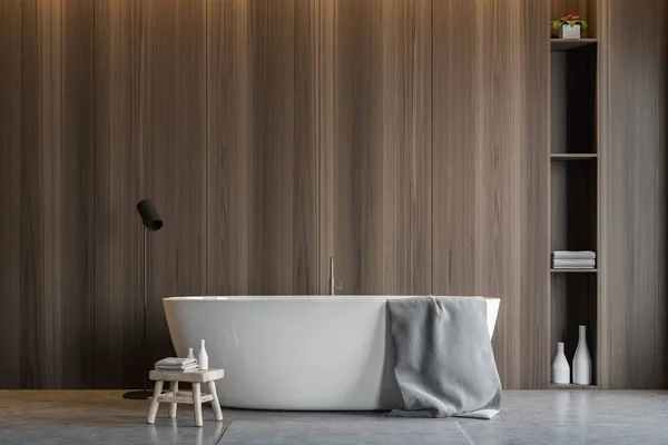 Dark wooden bathroom interior, tub and shelves — Stock Photo, Image