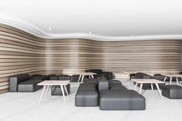 Dřevěná office lounge s černým křesla — Stock fotografie