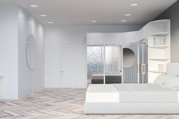 Side view of gray bedroom with wardrobe