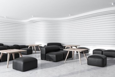 Beyaz ofis bekleme odası ile siyah koltuklar
