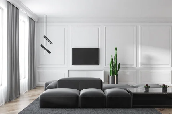 Interior de diseño moderno de la sala de estar con sofá y pantalla de TV . —  Fotos de Stock