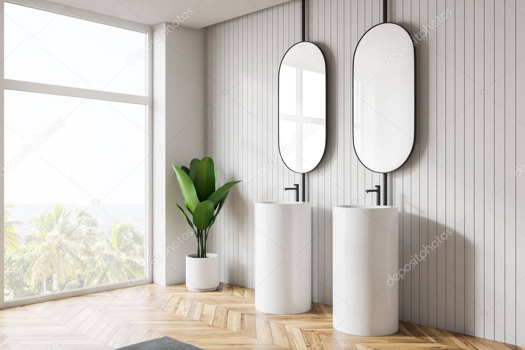 Modern light bathroom interior. Design mirrors