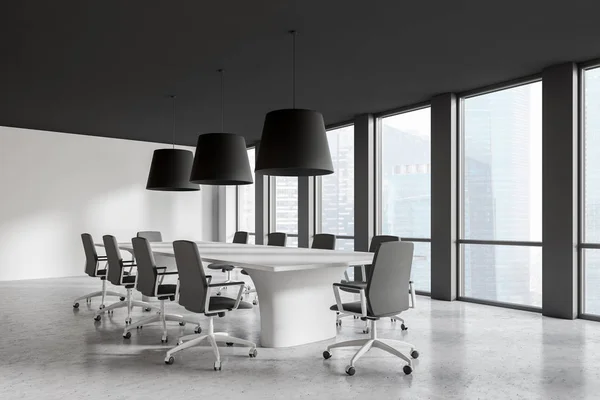 Modern conference room interior with window and city view