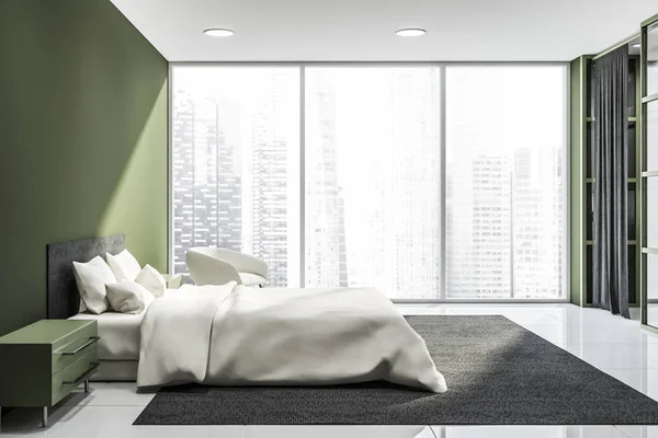 Дизайн интерьера зеленой спальни. С окном в город — стоковое фото