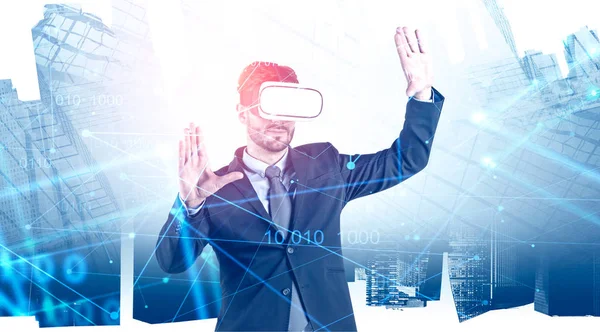 Businessman in VR glasses in city, writing code — Stock Photo, Image