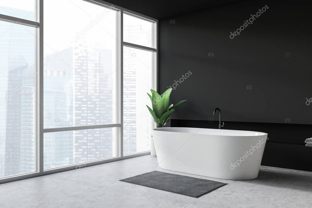 Modern design bathroom interior with bathtube and panoramic window.