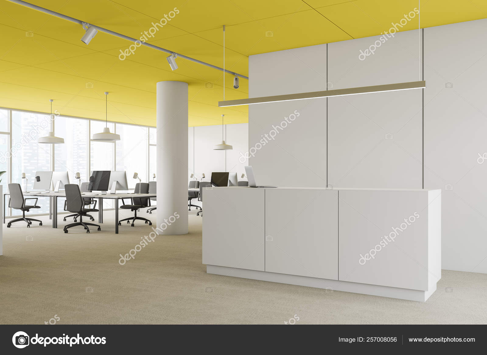 Side View Of Reception In Yellow Ceiling Office Stock