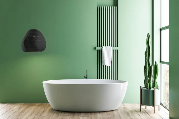 Zielona łazienka wnętrze z białą wanną — Zdjęcie stockowe