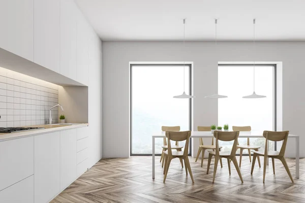 Loft cocina blanca con mesa y encimeras — Foto de Stock