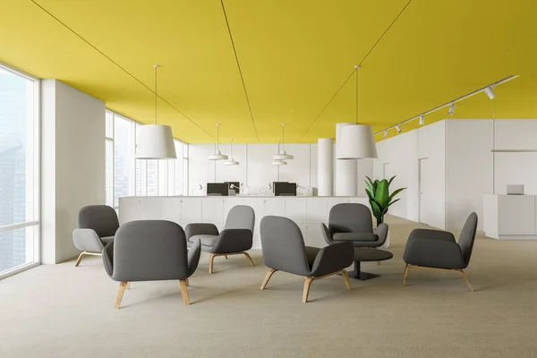 Yellow ceiling office waiting room — Stock Photo, Image