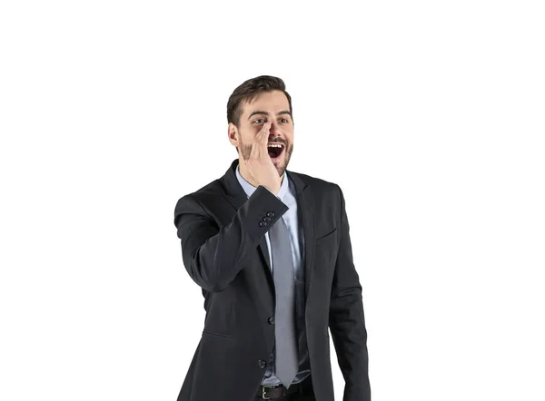 Człowiek w garnitur krzyku z ręka blisko usta — Zdjęcie stockowe