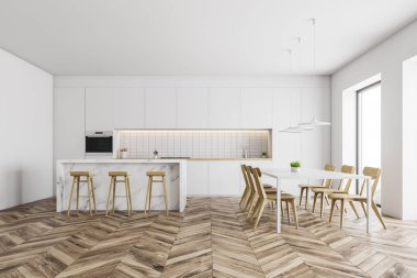 Bar ve yemek masalı beyaz mutfak.