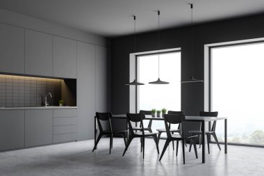 Sayaçları ve masa ile gri mutfak köşesi