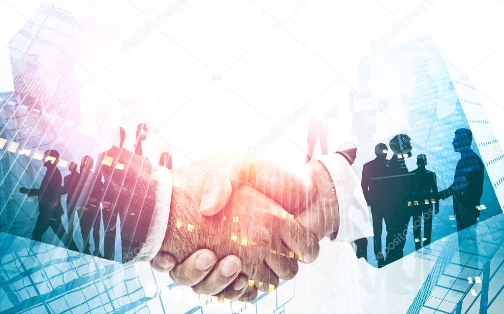 Business people shaking hands, teamwork