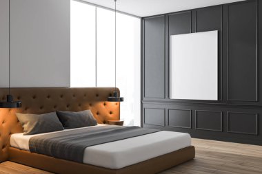 Poster ile beyaz ve gri yatak odası köşesi