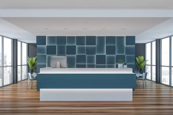 Blue reception desk in blue office — Stock Photo, Image