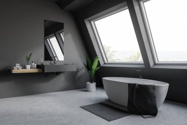 Tavan arası gri banyo köşesi, küvet ve lavabo