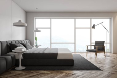 Koltuklu ana yatak odasının yan görünümü