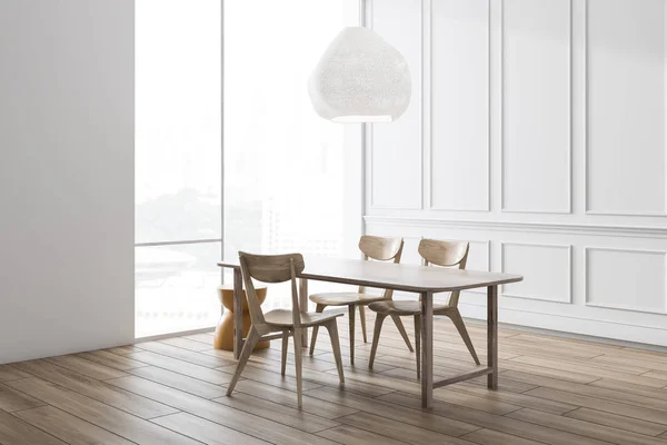 White dining room corner with wooden table — 스톡 사진